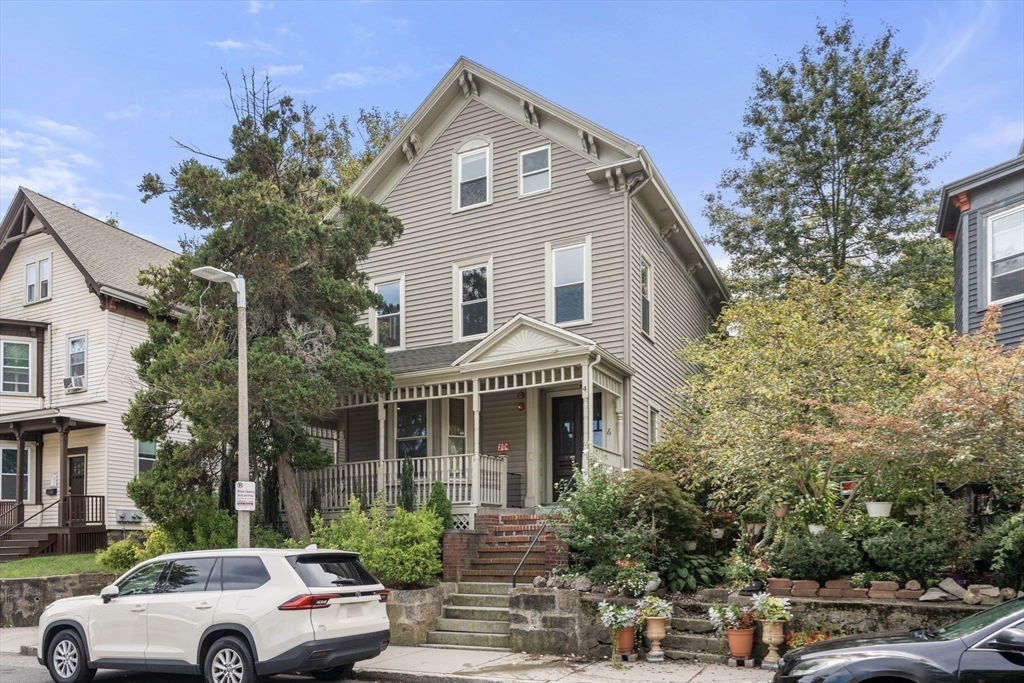 4 Wyoming Street, Unit 2 Boston, MA 02121 - Photo 22 of 23 a front view of a house with a garden