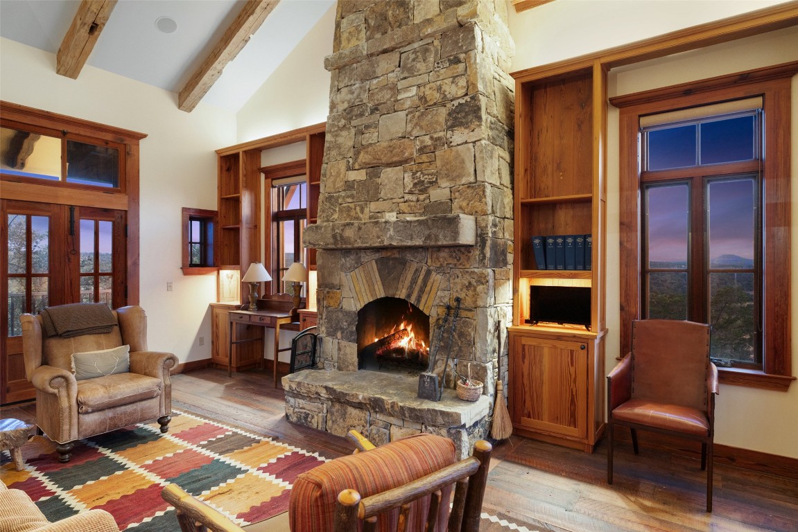 3503 Althaus-Davis Road Fredericksburg, TX 78624 - Photo 11 of 40 a living room with furniture and a fireplace