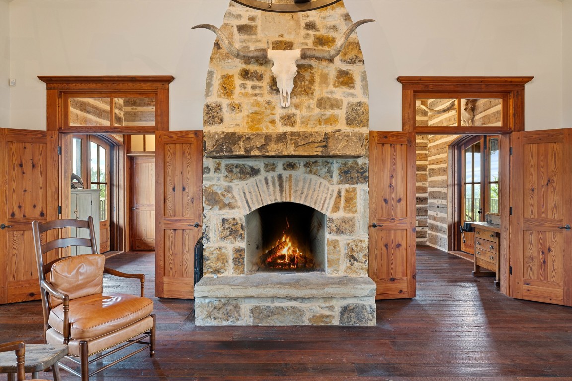 3503 Althaus-Davis Road Fredericksburg, TX 78624 - Photo 12 of 40 a living room with furniture and a fireplace