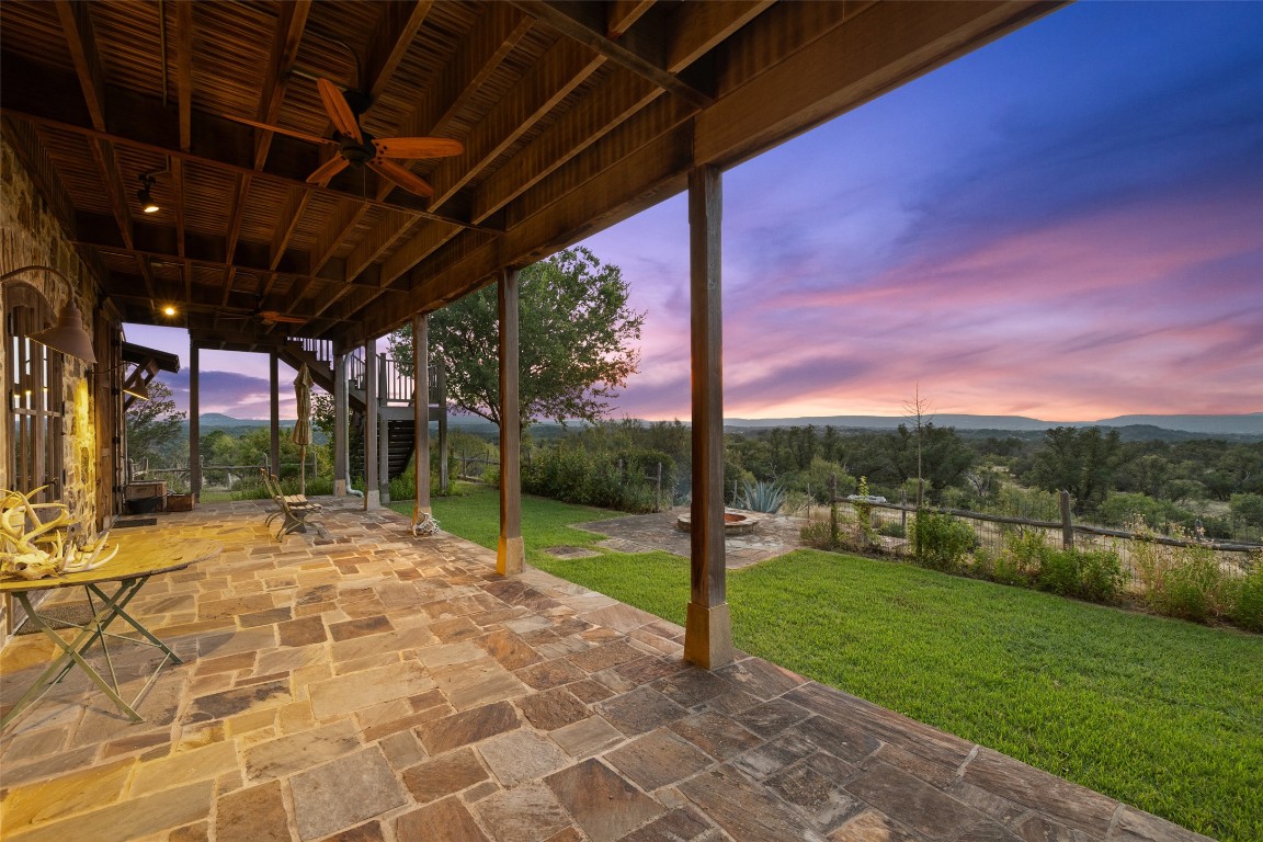 3503 Althaus-Davis Road Fredericksburg, TX 78624 - Photo 16 of 40 a view of a backyard with table and chairs