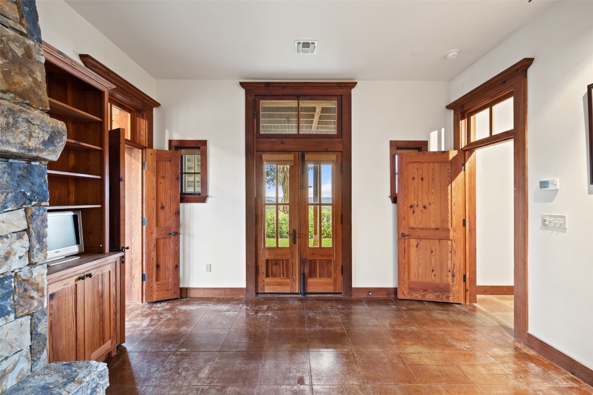 3503 Althaus-Davis Road Fredericksburg, TX 78624 - Photo 20 of 40 wooden floor and windows in a room