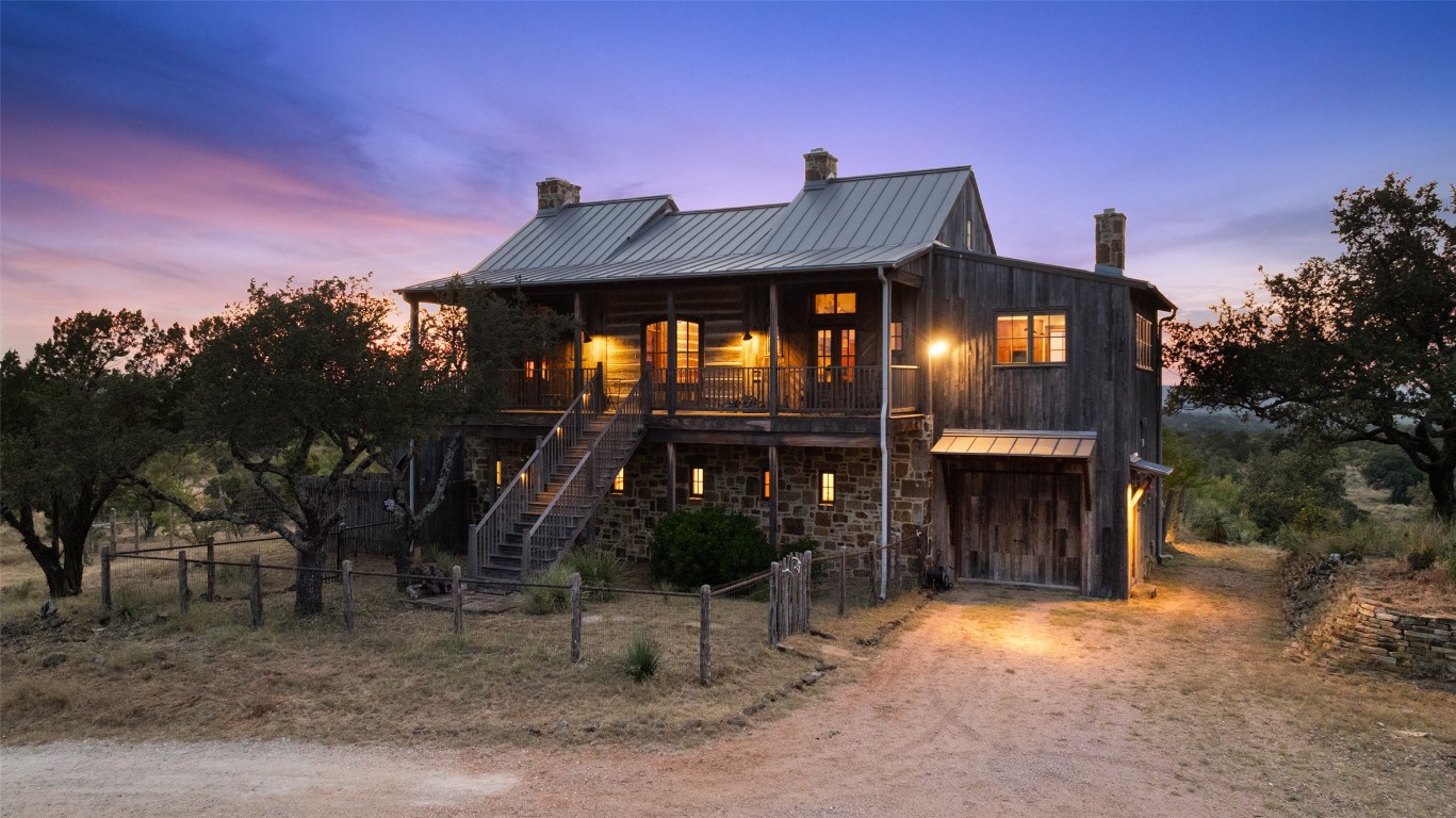3503 Althaus-Davis Road Fredericksburg, TX 78624 - Photo 2 of 40 a front view of a house with a yard