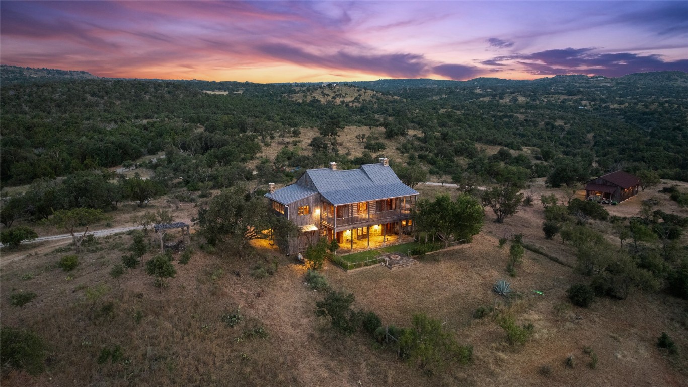 3503 Althaus-Davis Road Fredericksburg, TX 78624 - Photo 3 of 40 an aerial view of a house with a mountain view
