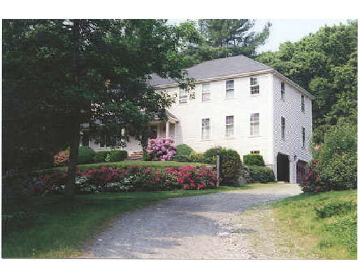 140 Stow Road Harvard, MA 01451 - Photo 1 of 1 a front view of a house with garden
