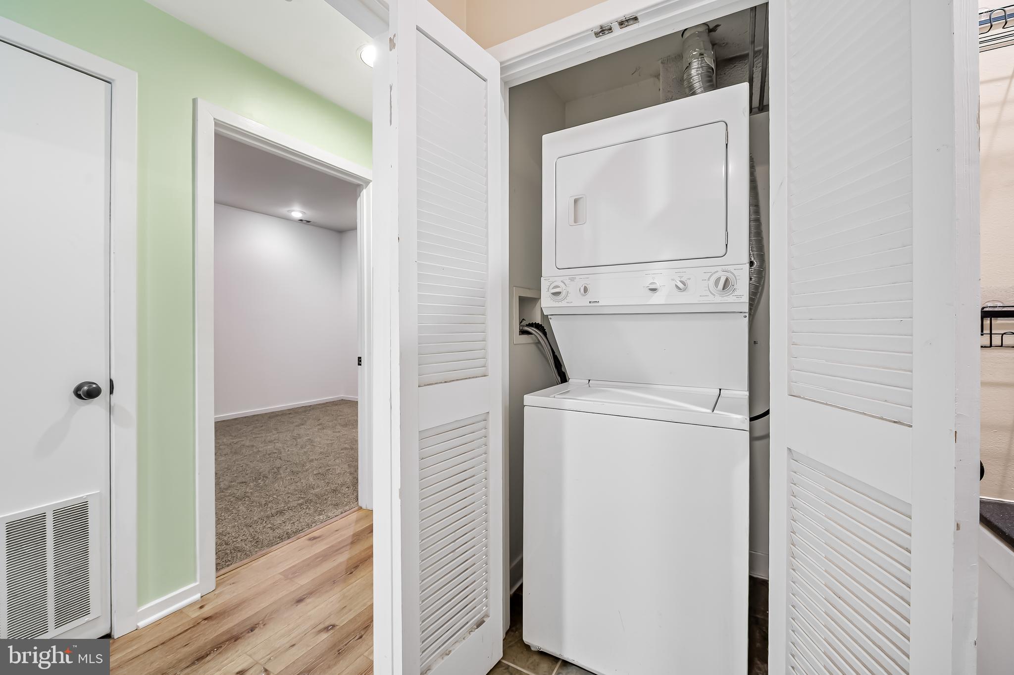 1211 Light Street, Unit 103 Baltimore, MD 21230 - Photo 19 of 31 a utility room with dryer and washer