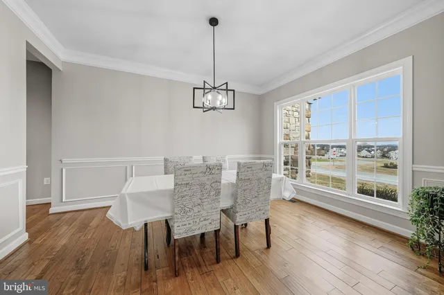 a bedroom with a bed and a bookshelf