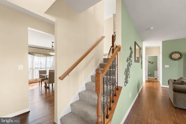 a view of swimming pool with sitting area