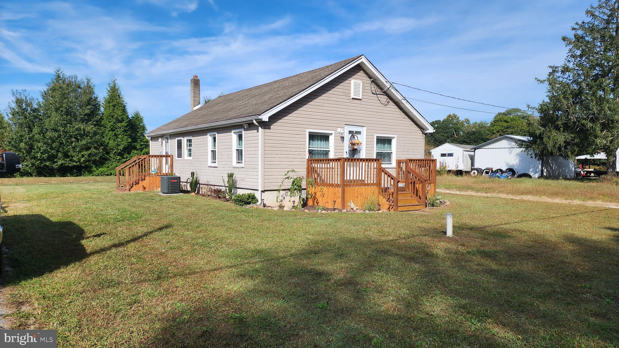 617 Lower Mill Road Pittsgrove, NJ 08318 - Photo 3 of 12 a view of a house with a yard