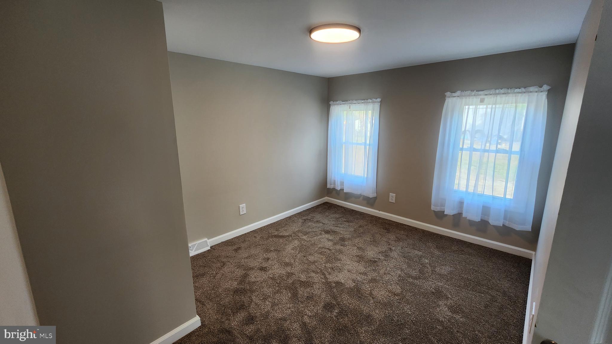 617 Lower Mill Road Pittsgrove, NJ 08318 - Photo 10 of 12 an empty room with a window