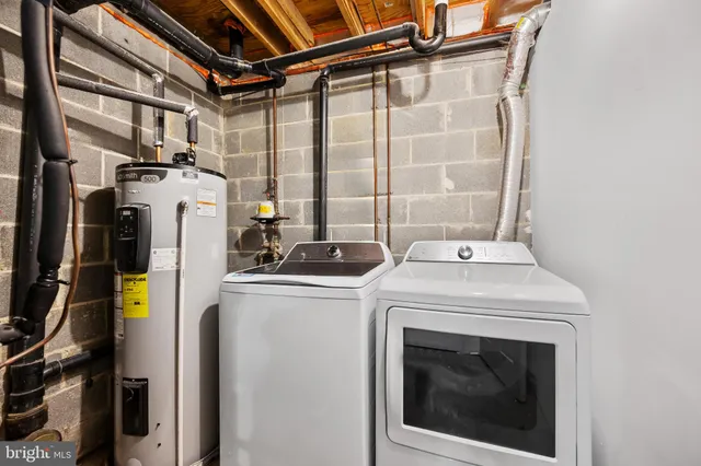 a view of a brick house with many windows