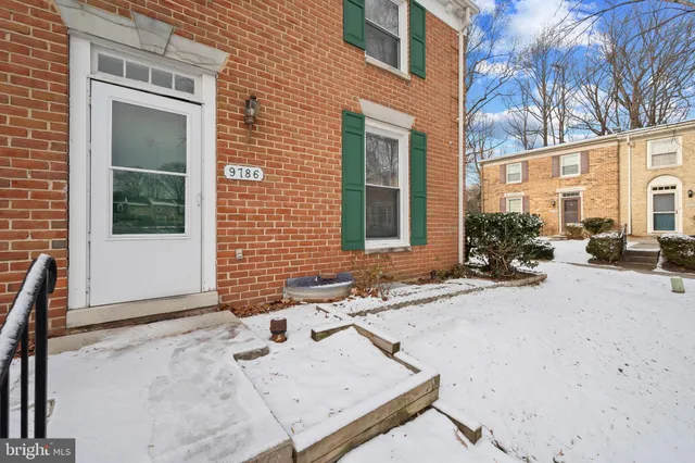 a view of a building with sitting area
