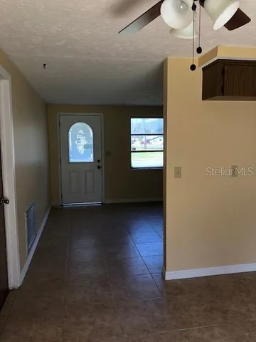 a view of a livingroom with a window