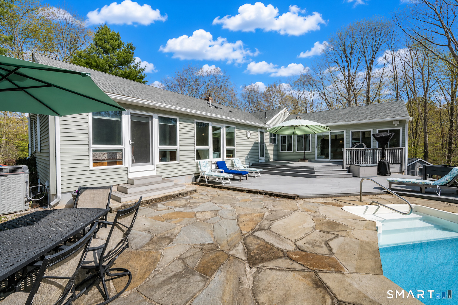193 R Blue Hills Road Durham, CT 06422 - Photo 24 of 30 a view of a house with sitting area and furniture