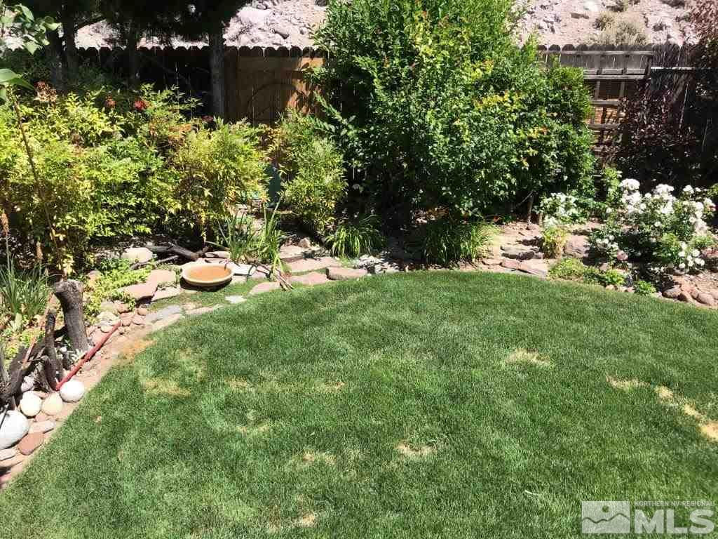 4610 Goodwin Road Sparks, NV 89436 - Photo 21 of 31 a view of a backyard of the house