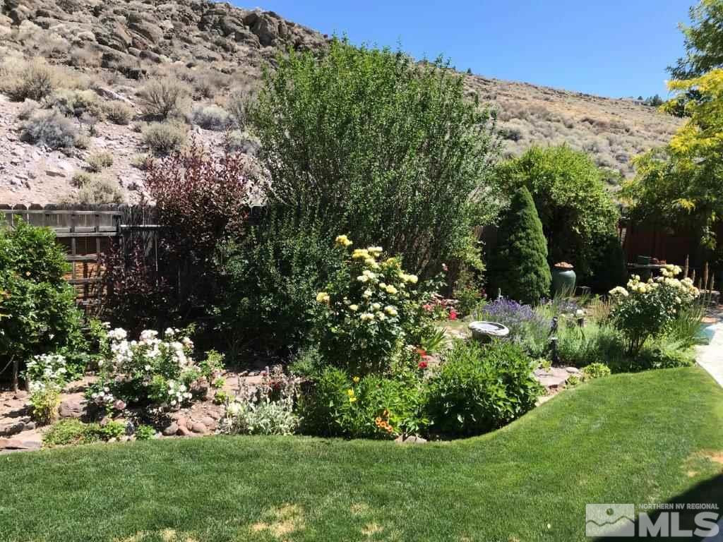 4610 Goodwin Road Sparks, NV 89436 - Photo 23 of 31 a view of a garden with a house