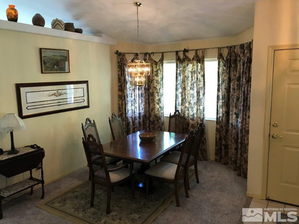 4610 Goodwin Road Sparks, NV 89436 - Photo 7 of 31 a dining room with furniture and window