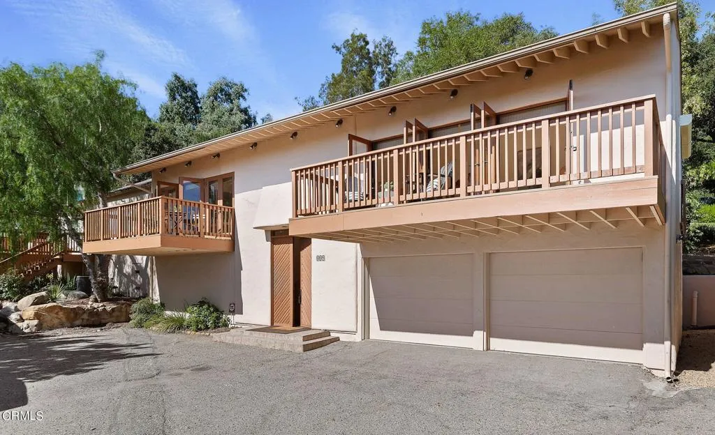 a view of a house with a garage