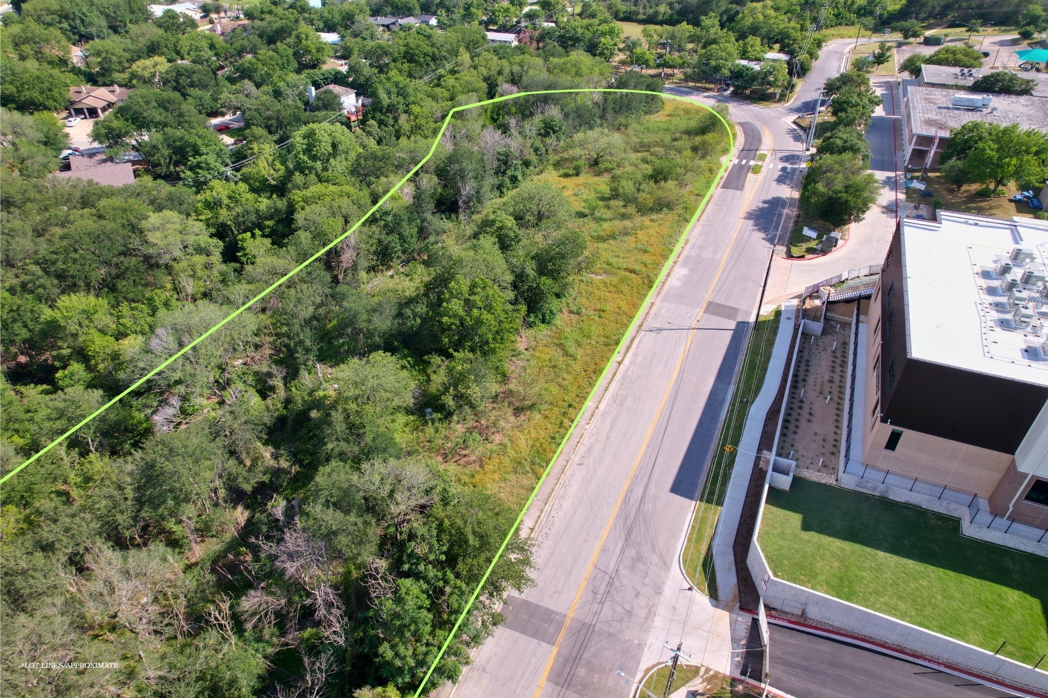 2813-2827 Metcalfe Road Austin, TX 78741 - Photo 10 of 13 A valuable raw land parcel awaits development, perfectly positioned for future growth. New elementary school just across the street.