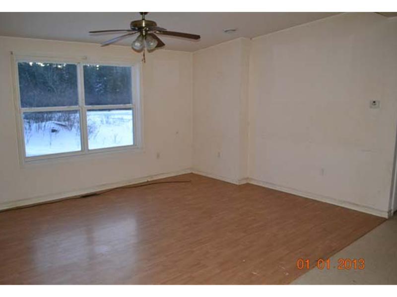 65 Houlton Road Baileyville, ME 04694 - Photo 6 of 10 Living Room.