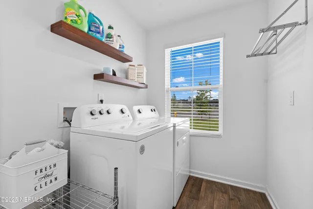 a utility room with dryer and washer