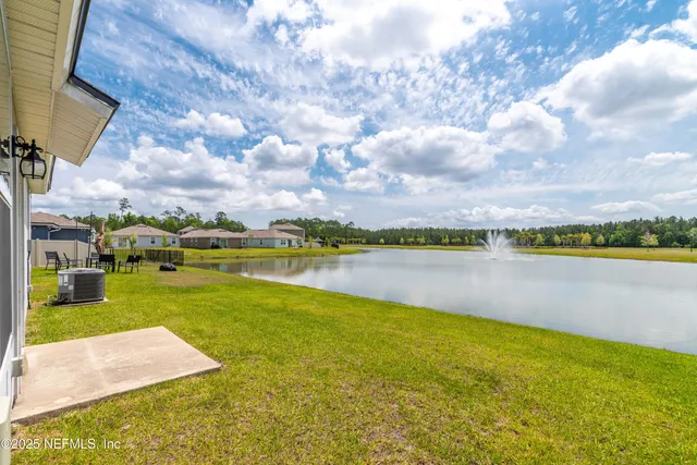 a view of swimming pool and lake