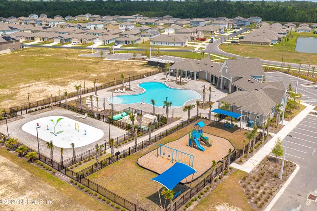 a view of a swimming pool with an ocean view
