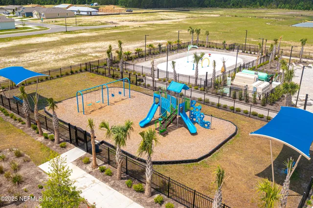 a view of an outdoor space with swimming pool