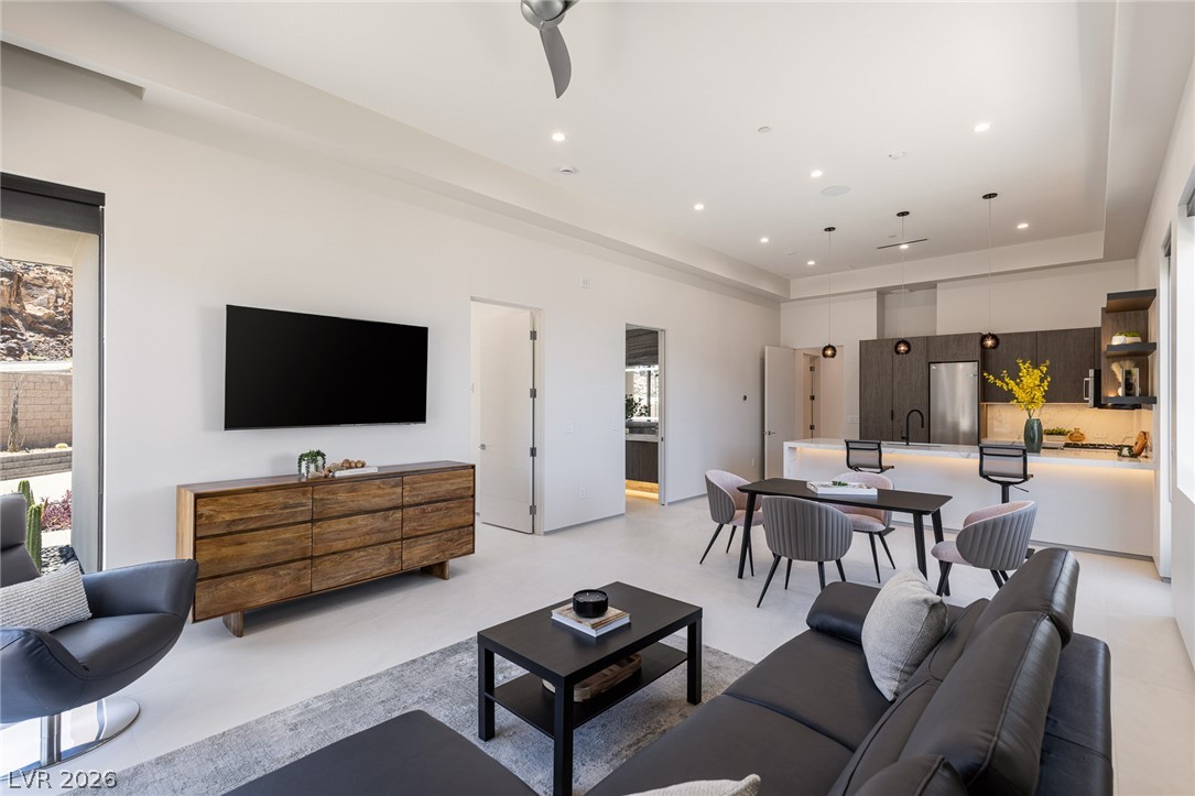 563 Grand Rim Drive Henderson, NV 89012 - Photo 35 of 70 An open-concept attached casita contemporary kitchen flows seamlessly into a spacious living area.