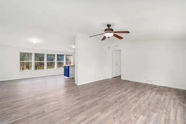 a view of cabinets and window