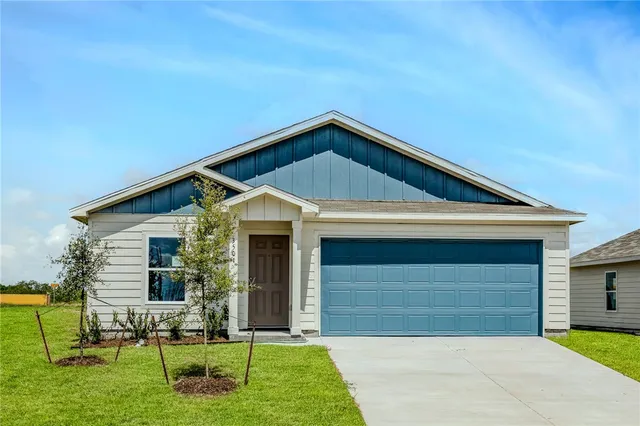 a front view of house with yard