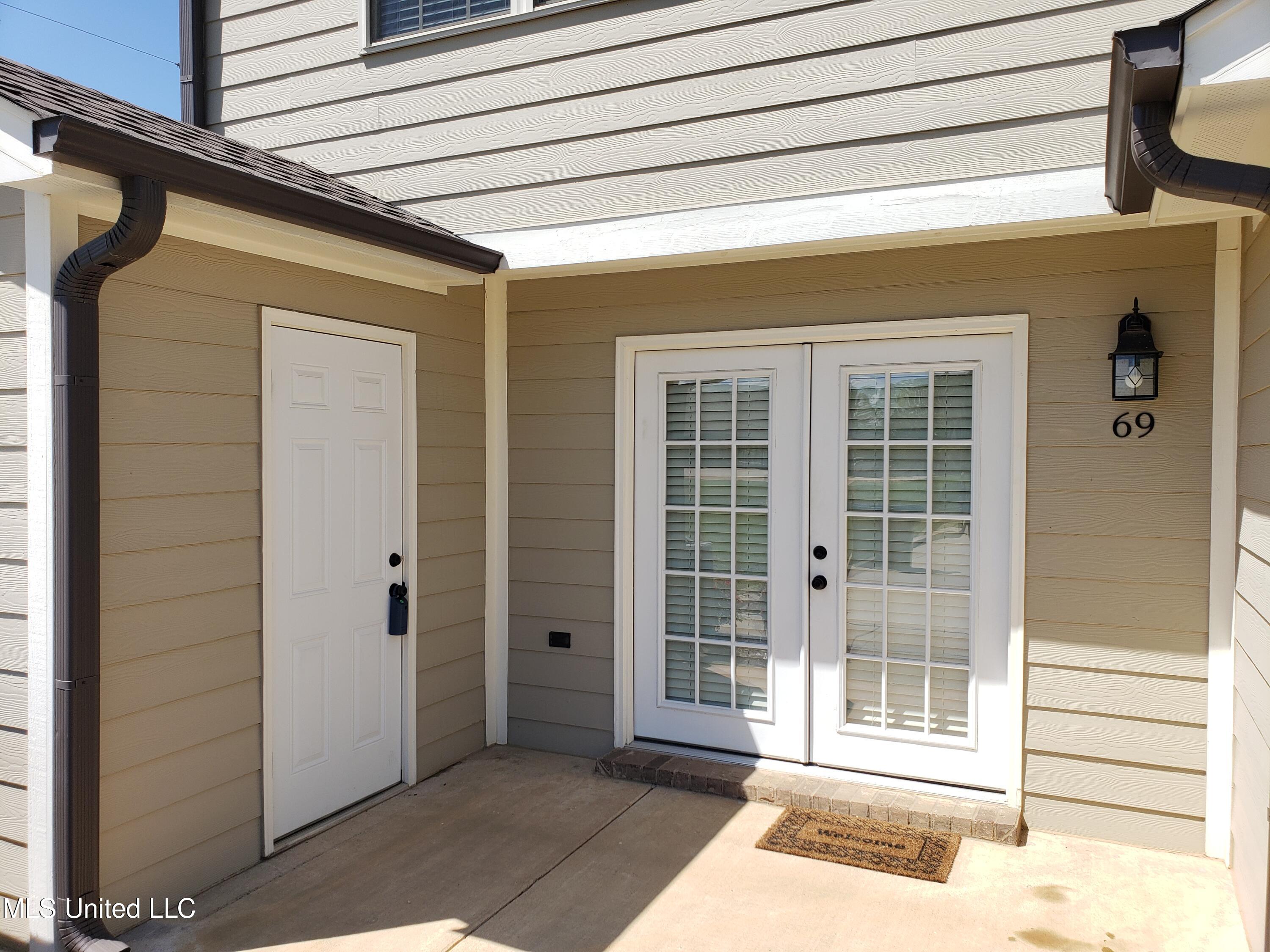 69 East Valley Street Hernando, MS 38632 - Photo 49 of 55 Patio and Door to Storage