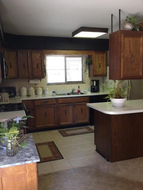 1069 Capello Way Ojai, CA 93023 - Photo 4 of 4 a kitchen with a sink a counter top space and cabinets