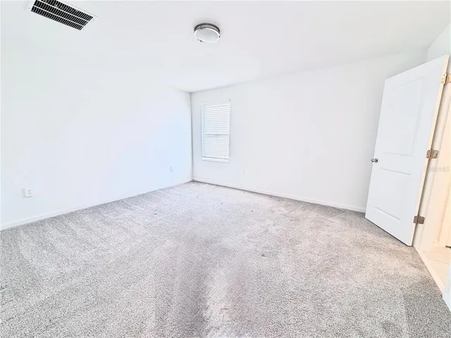 an empty room with an entryway