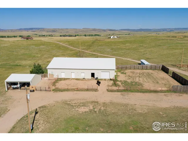 a view of a house with a big yard