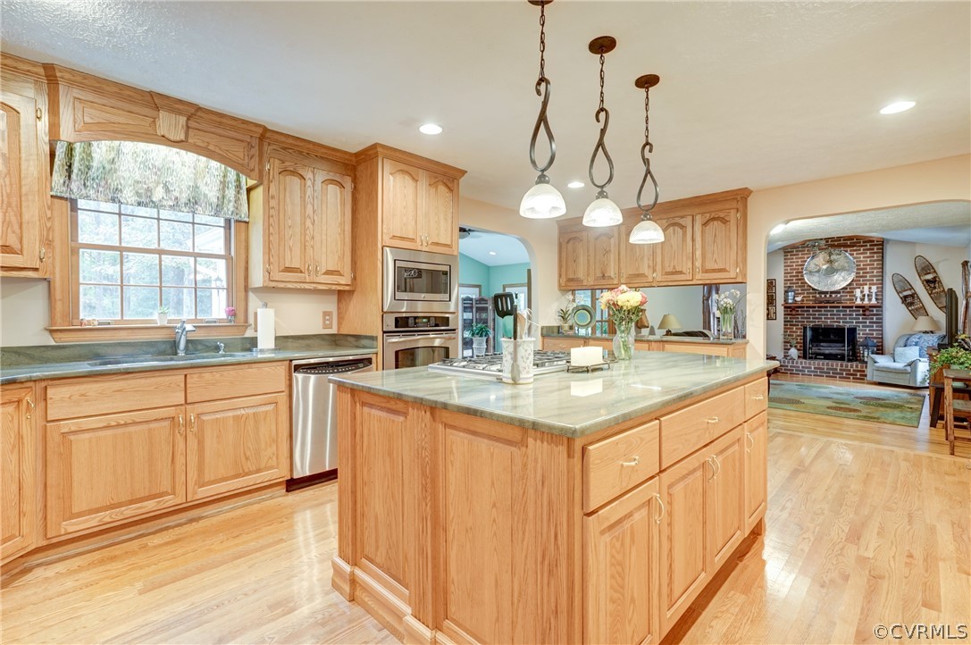 9610 Old Forge Road Providence Forge, VA 23140 - Photo 11 of 44 a kitchen with granite countertop a sink cabinets and window
