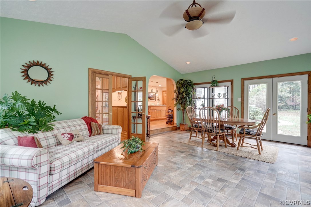 9610 Old Forge Road Providence Forge, VA 23140 - Photo 19 of 44 a living room with furniture and floor to ceiling windows