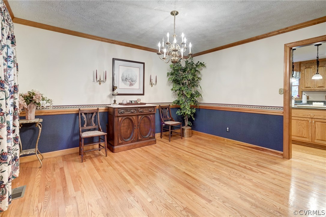 9610 Old Forge Road Providence Forge, VA 23140 - Photo 20 of 44 a view of a room with furniture and chandelier