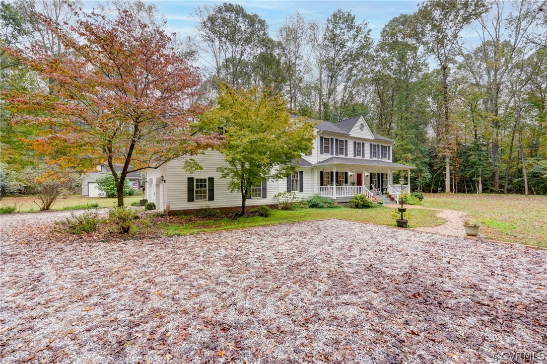 9610 Old Forge Road Providence Forge, VA 23140 - Photo 2 of 44 a house with trees in the background