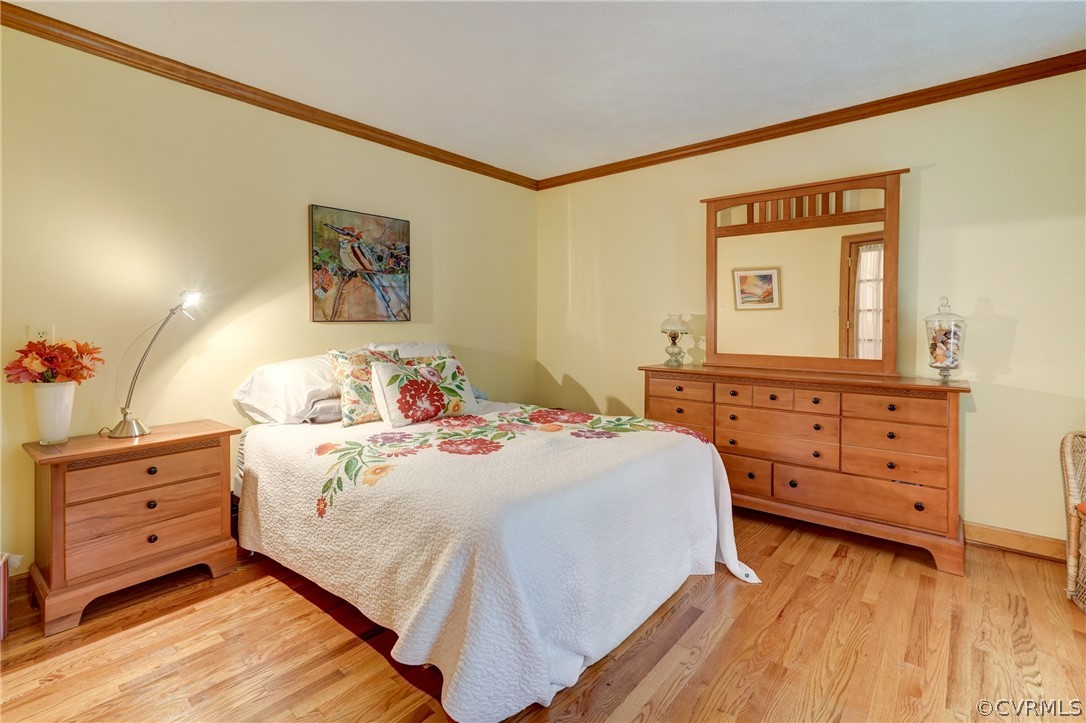 9610 Old Forge Road Providence Forge, VA 23140 - Photo 22 of 44 a bedroom with a bed and a dresser