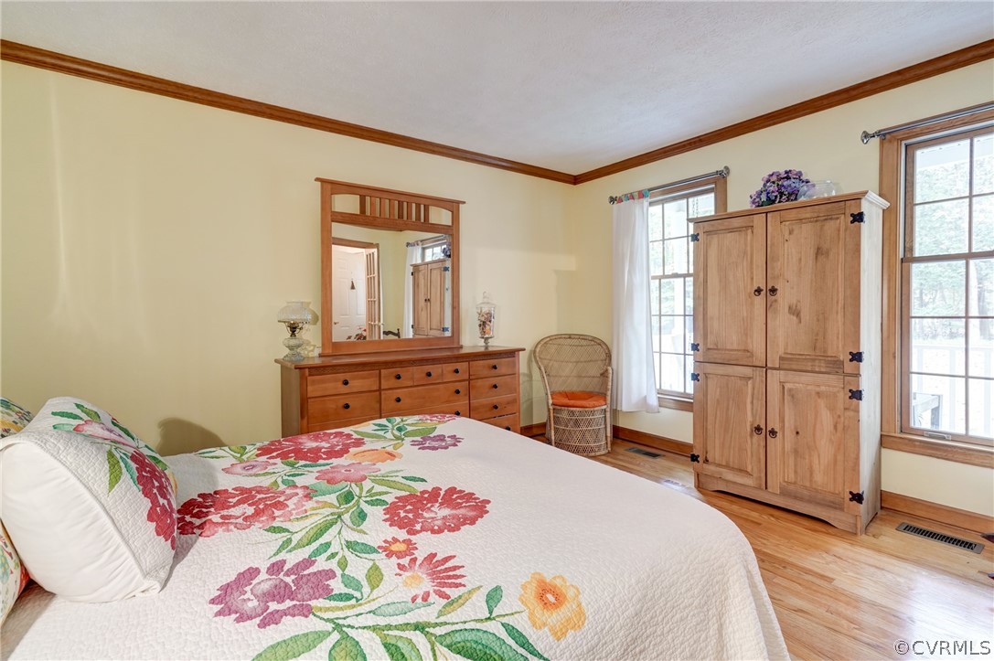 9610 Old Forge Road Providence Forge, VA 23140 - Photo 23 of 44 a bedroom with a bed and a dresser