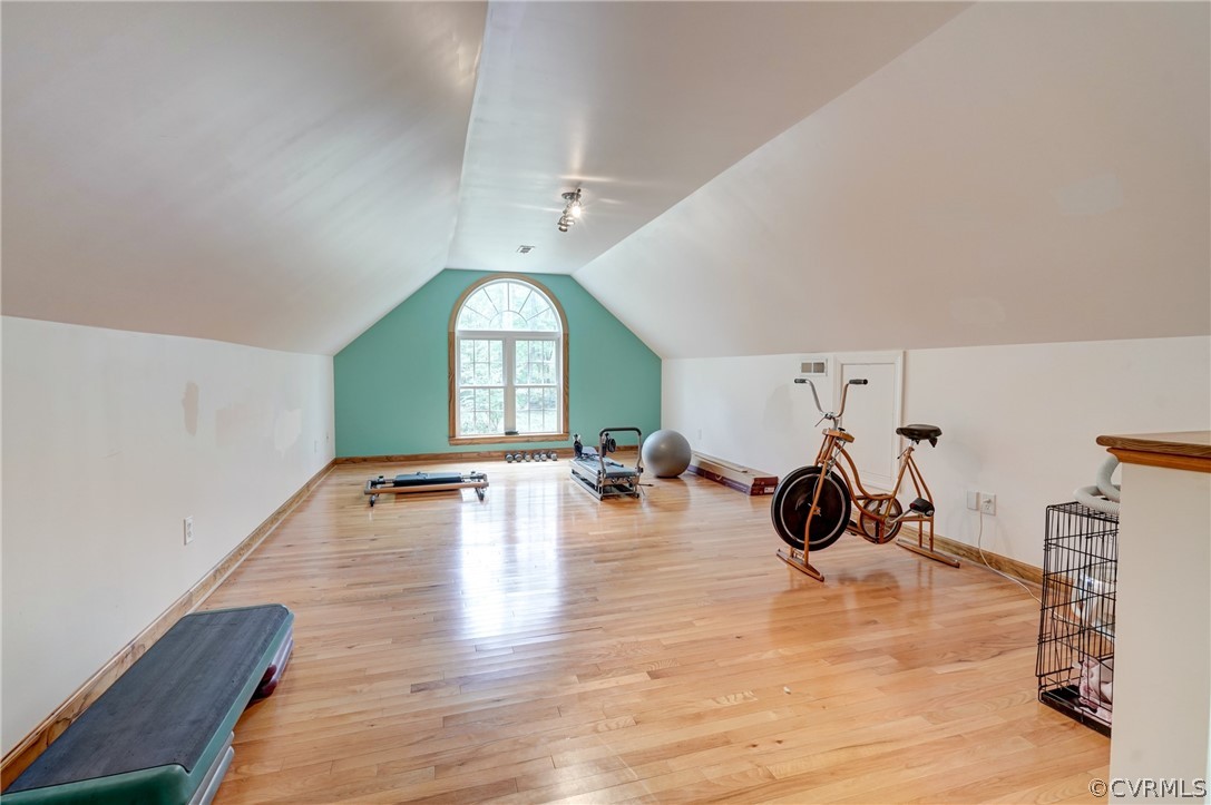 9610 Old Forge Road Providence Forge, VA 23140 - Photo 26 of 44 a view of a room with wooden floor and lounge chair