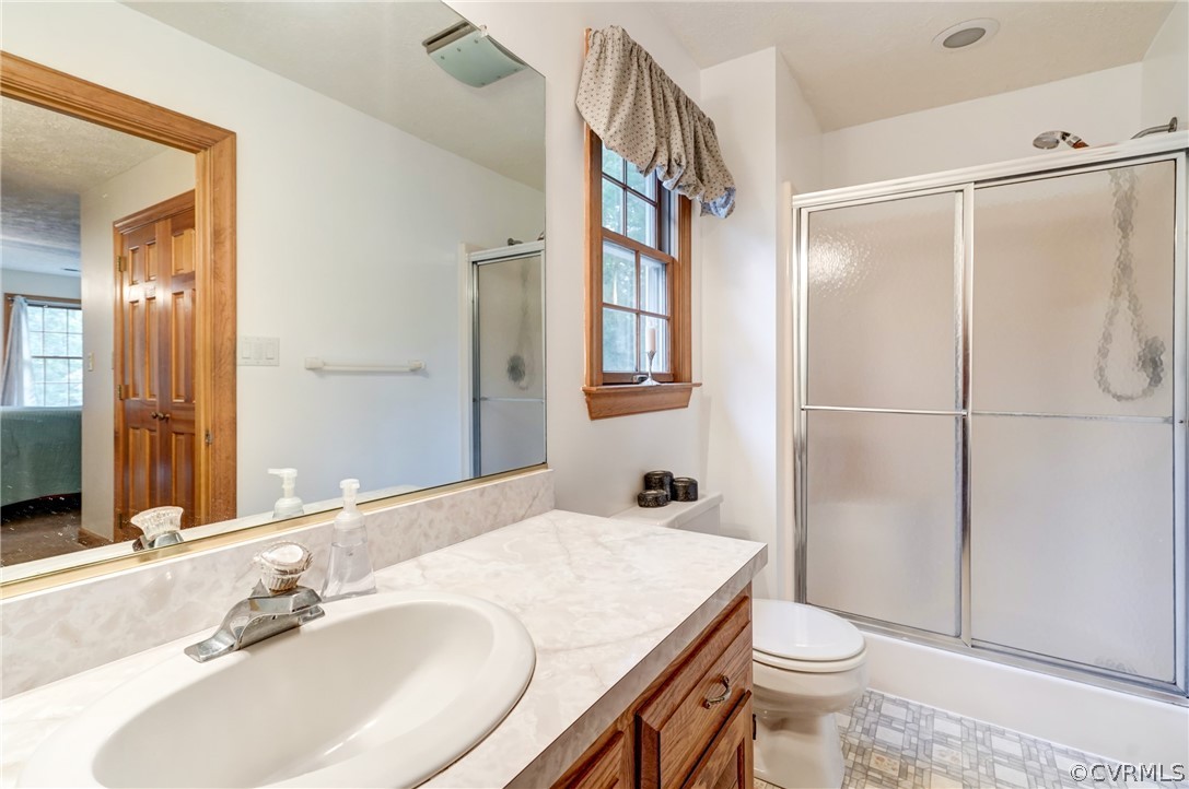 9610 Old Forge Road Providence Forge, VA 23140 - Photo 31 of 44 a bathroom with a sink toilet and shower