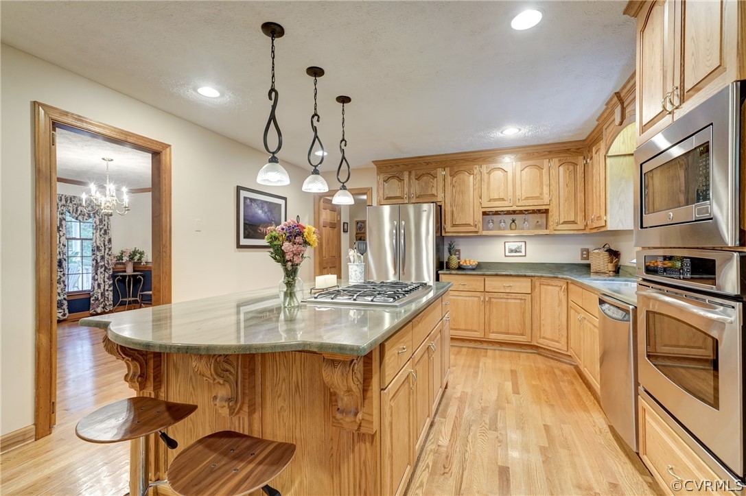 9610 Old Forge Road Providence Forge, VA 23140 - Photo 10 of 44 a large kitchen with kitchen island lots of counter space a sink and appliances