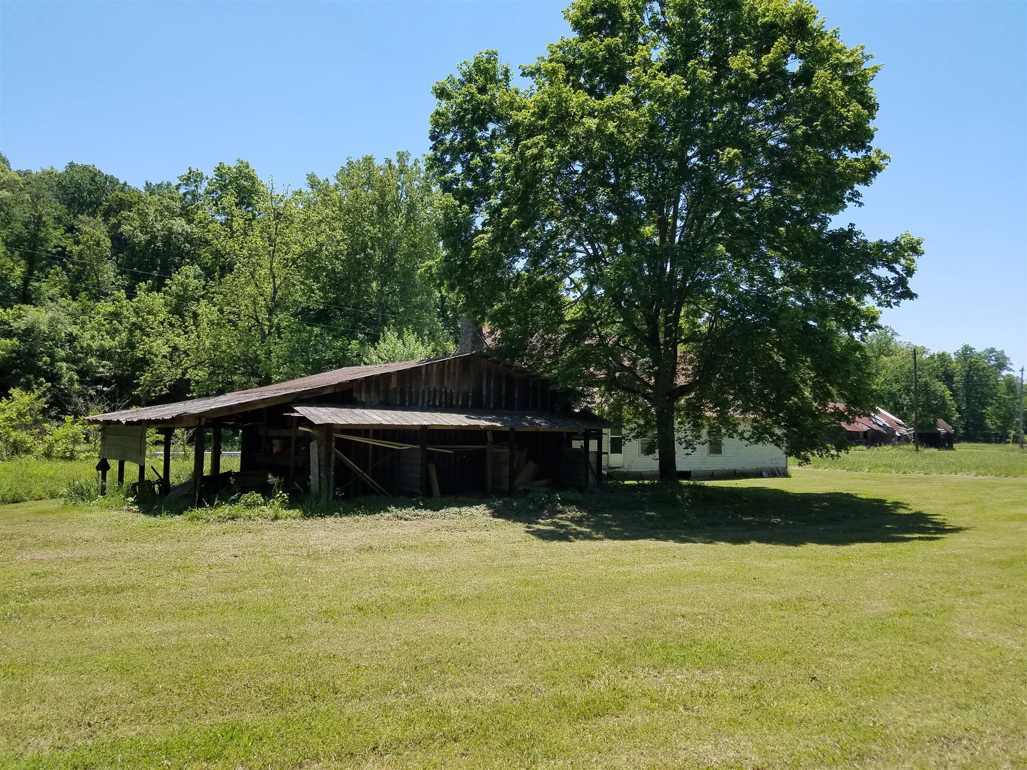 5770 South Lick Creek Road Franklin, TN 37064 - Photo 5 of 5 a swimming pool with outdoor seating and yard