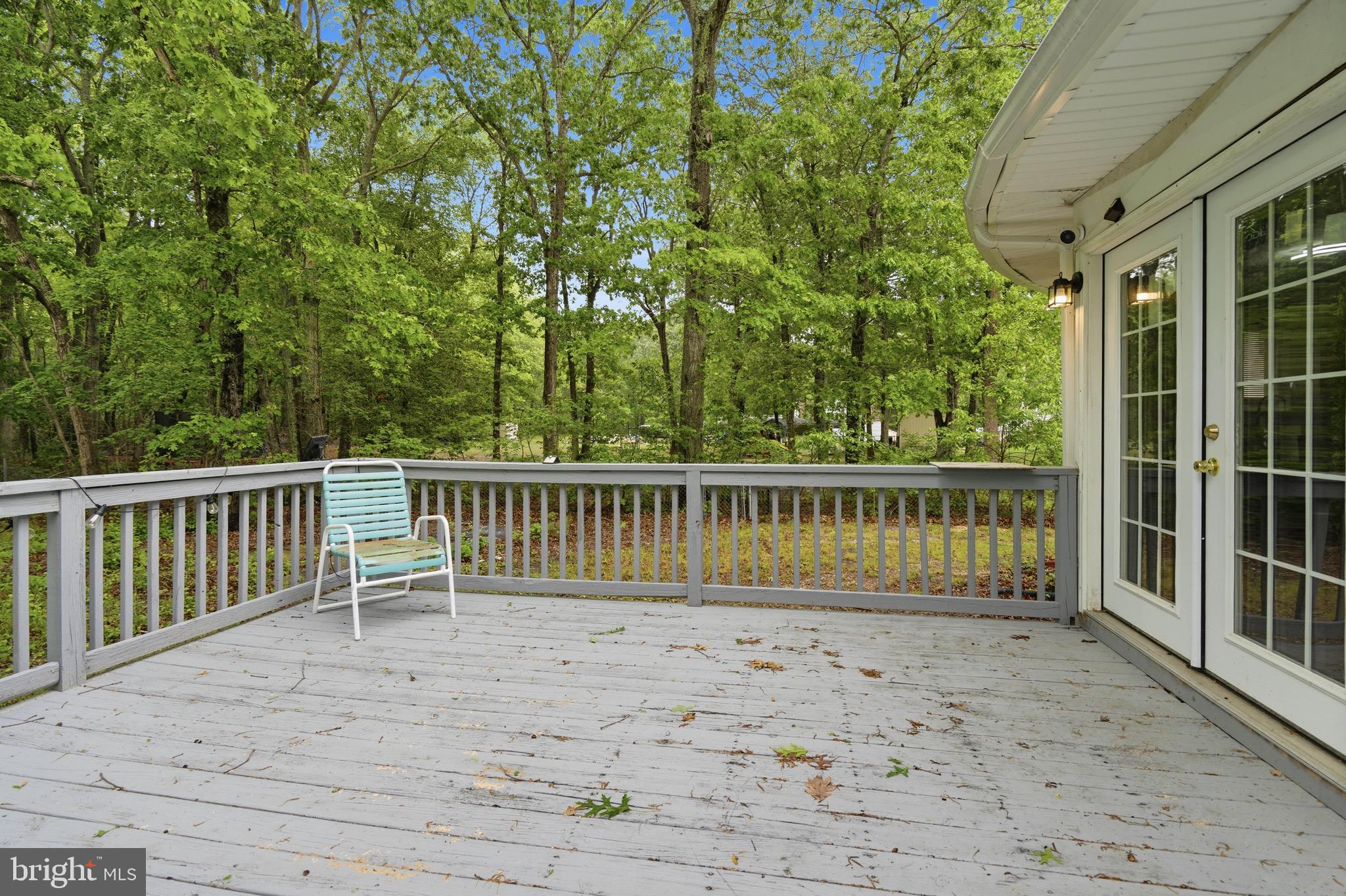 188 Carlisle Place Road Leesburg, NJ 08327 - Photo 29 of 36 a view of a wooden deck with a yard
