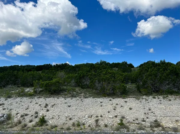 a view of a lake from a yard