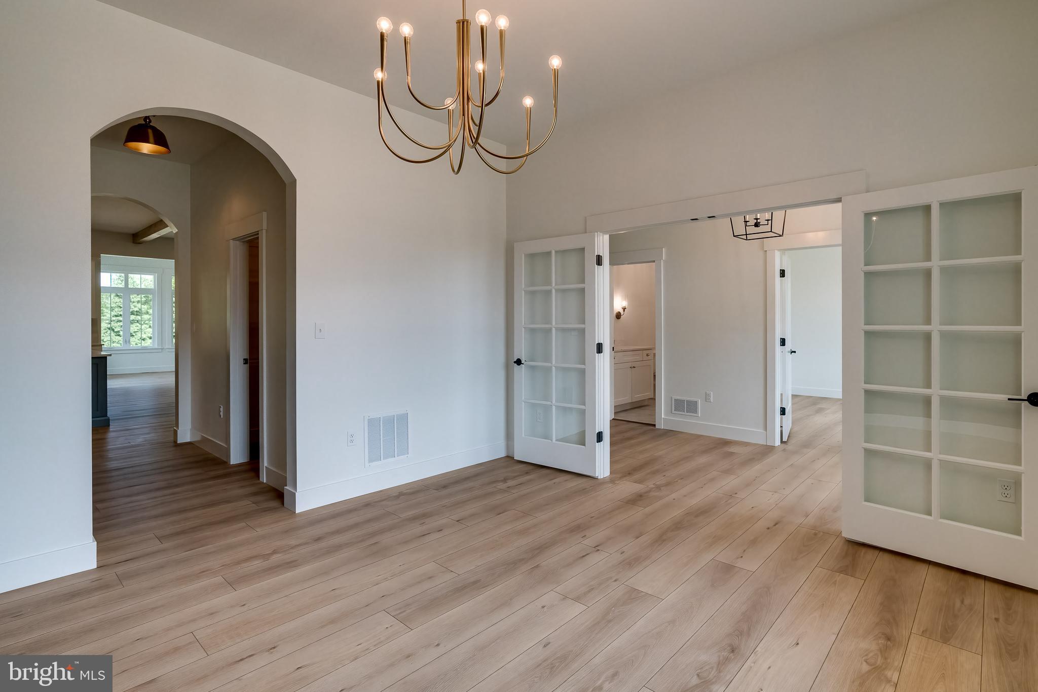301 Fletcher Drive Lititz, PA 17543 - Photo 5 of 17 wooden floor in an empty room with a window