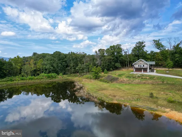 a view of a lake with a mountain in the background