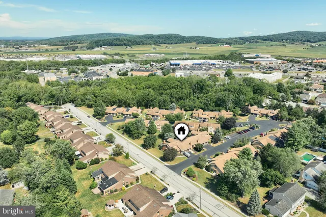 a front view of a house with a garage