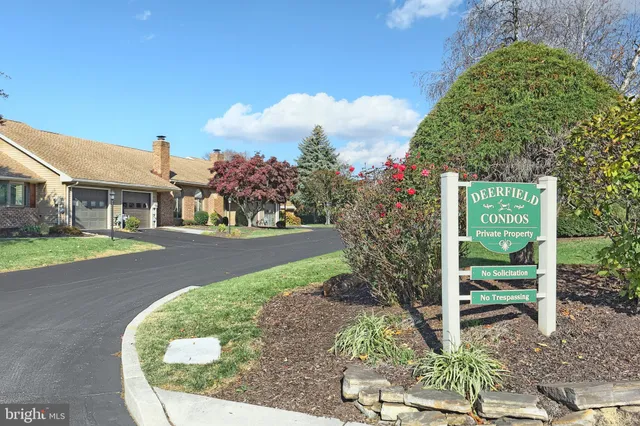 a picture of a counter top space with a refrigerator